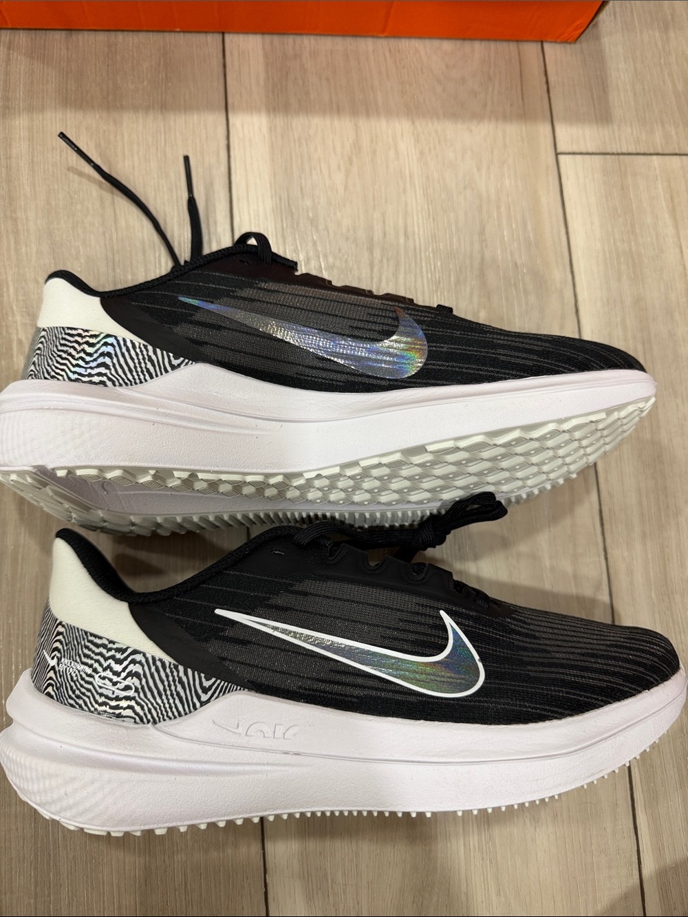 Nike Black Running Sneakers with Iridescent Swoosh